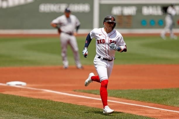 Enrique Hernandez of the Boston Red Sox rounds the bases after hitting a home run during the first inning against the New York Yankees at Fenway Park...