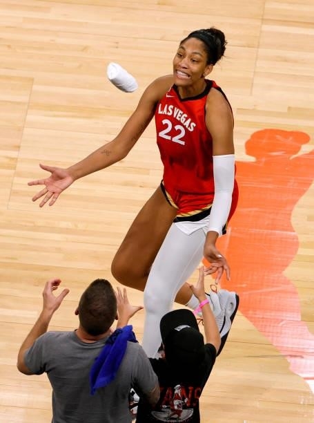 Ja Wilson of the Las Vegas Aces tosses a T-shirt to fans after the team's 95-92 overtime victory over the Seattle Storm at Michelob ULTRA Arena on...