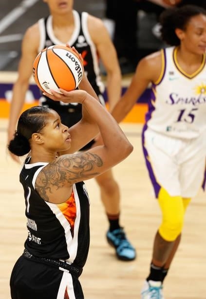 Kia Vaughn of the Phoenix Mercury takes a shot against the Los Angeles Sparks during the second half of the WNBA game at Phoenix Suns Arena on June...