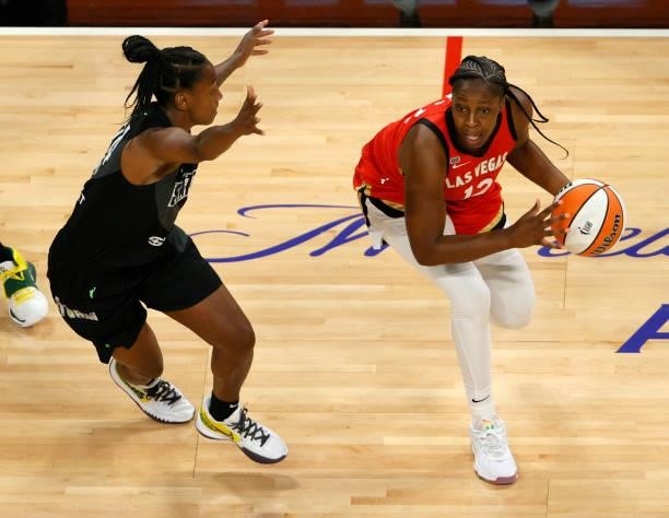 Chelsea Gray of the Las Vegas Aces drives against Jewell Loyd of the Seattle Storm during their game at Michelob ULTRA Arena on June 27, 2021 in Las...