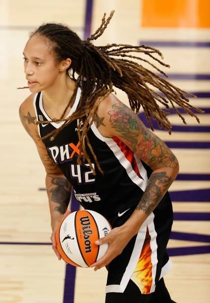 Brittney Griner of the Phoenix Mercury in-bounds the ball during the first half of the WNBA game against the Los Angeles Sparks at Phoenix Suns Arena...