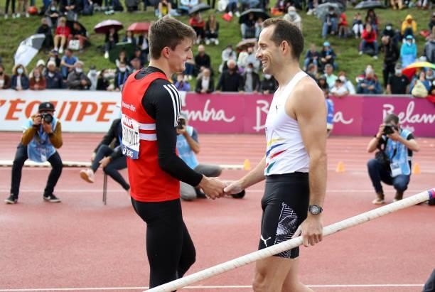 Winner of Pole Vault final Ethan Cormont salutes second place Renaud Lavillenie after Lavillenie missed his last jump during day 3 of the 2021 French...