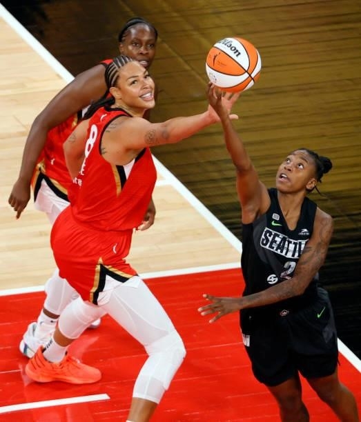 Jewell Loyd of the Seattle Storm shoots a reverse layup against Liz Cambage of the Las Vegas Aces during their game at Michelob ULTRA Arena on June...