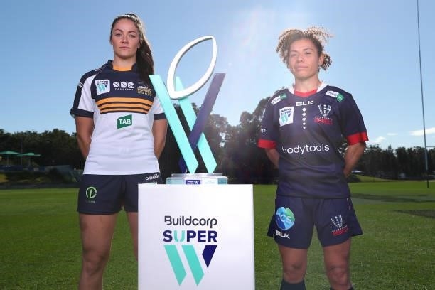 Super W Captains Michaela Leonard of the Brumbies and Melanie Kawa of the Rebels pose during the 2021 Super W Captain's media call on June 28, 2021...