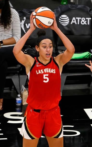 Dearica Hamby of the Las Vegas Aces looks to pass against the Seattle Storm during their game at Michelob ULTRA Arena on June 27, 2021 in Las Vegas,...