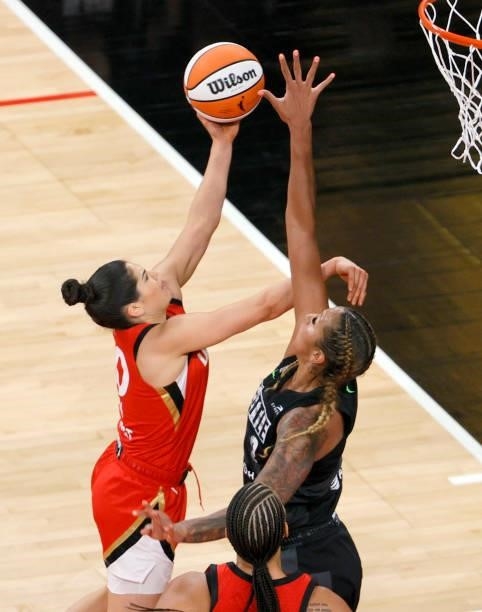 Kelsey Plum of the Las Vegas Aces shoots against Mercedes Russell of the Seattle Storm during their game at Michelob ULTRA Arena on June 27, 2021 in...