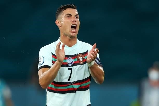 Cristiano Ronaldo of Portugal reacts during the UEFA Euro 2020 Championship Round of 16 match between Belgium and Portugal at Estadio La Cartuja on...