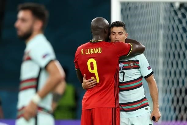 Romelu Lukaku of Belgium consoles Cristiano Ronaldo of Portugal following the UEFA Euro 2020 Championship Round of 16 match between Belgium and...