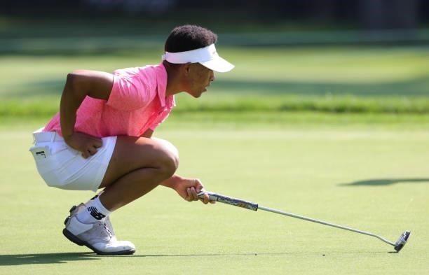 Anita Uwadia lines up her putt on the first hole during day three of the John Shippen Invitational on June 28, 2021 at the Detroit Golf Club in...