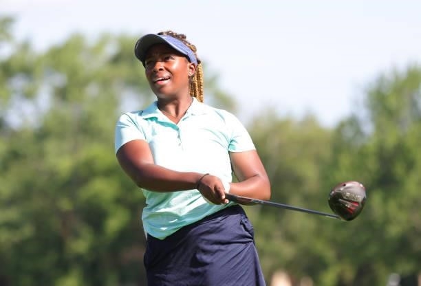 Christyn Carr hits her tee shots on the second hole during day three of the John Shippen Invitational on June 28, 2021 at the Detroit Golf Club in...