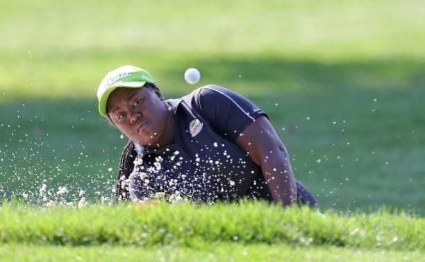 Tiana Joneshits her ball from a green side bunker during day three of the John Shippen Invitational on June 28, 2021 at the Detroit Golf Club in...