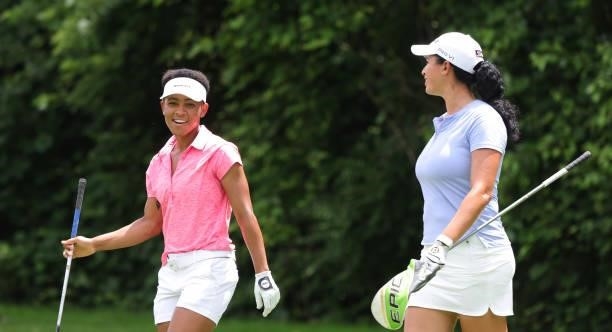 Shasta Averyhardt and Anita Uwadia share a laugh on the 17th tee box during the third day of the The John Shippen National Invitational on June 28,...