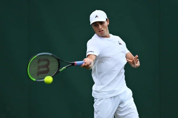Christopher O'Connell of Australia plays a forehand in his Men's Singles First Round match against Gael Monfils of France during Day One of The...