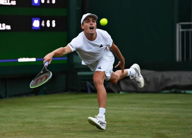 Christopher O'Connell of Australia stretches to play a forehand in his Men's Singles First Round match against Gael Monfils of France during Day One...
