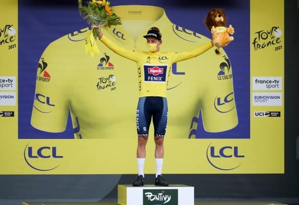 Mathieu Van Der Poel of Netherlands and Alpecin - Fenix retains the yellow jersey of race's leader during the podium ceremony of stage 3 of the 108th...