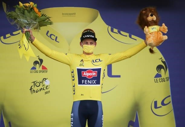 Mathieu Van Der Poel of Netherlands and Alpecin - Fenix retains the yellow jersey of race's leader during the podium ceremony of stage 3 of the 108th...