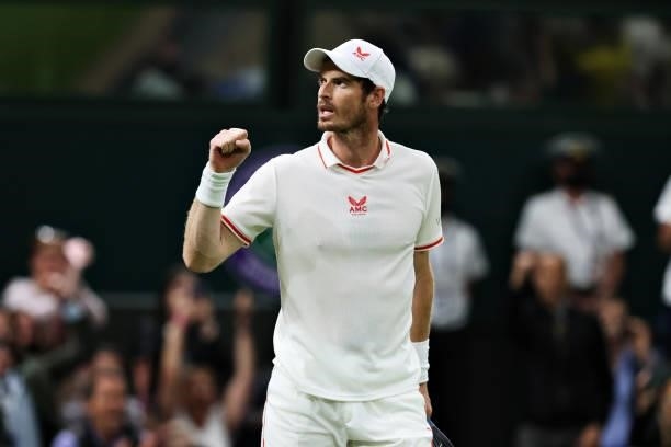 Andy Murray of Great Britain celebrates after winning match point in his Men's Singles First Round match against Nikoloz Basilashvili of Georgia...