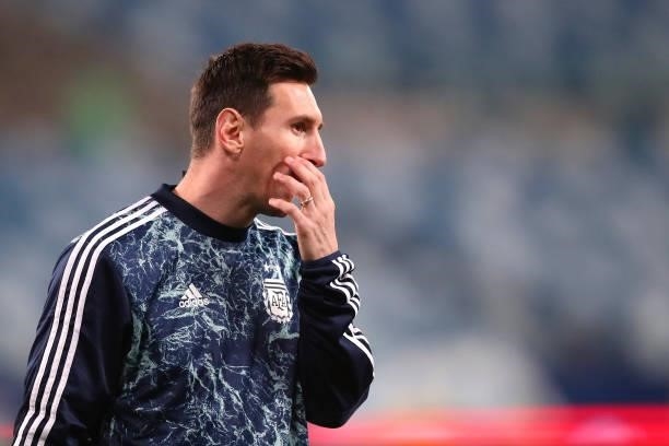 Lionel Messi of Argentina gestures during warm up prior to a Group A match between Argentina and Bolivia as part of Copa America 2021 at Arena...