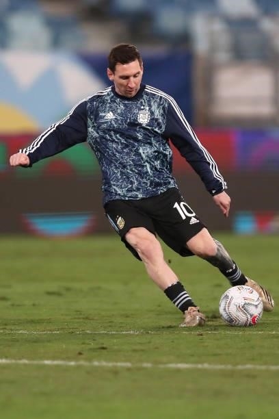 Lionel Messi of Argentina warms up prior to a Group A match between Argentina and Bolivia as part of Copa America 2021 at Arena Pantanal on June 28,...