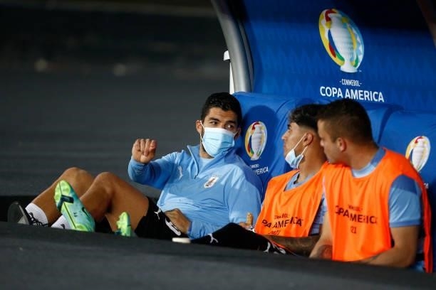 Luis Suarez of Uruguay talks with teammates before a group A match between Uruguay and Paraguay as part of Conmebol Copa America Brazil 2021 at...