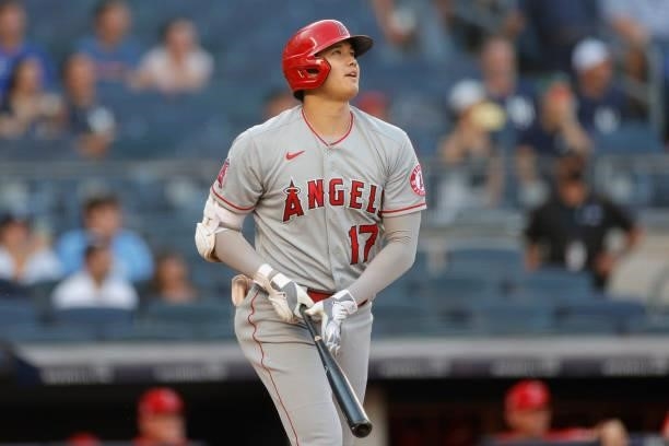 Shohei Ohtani of the Los Angeles Angels reacts after hitting a solo home run during the first inning against the New York Yankees at Yankee Stadium...