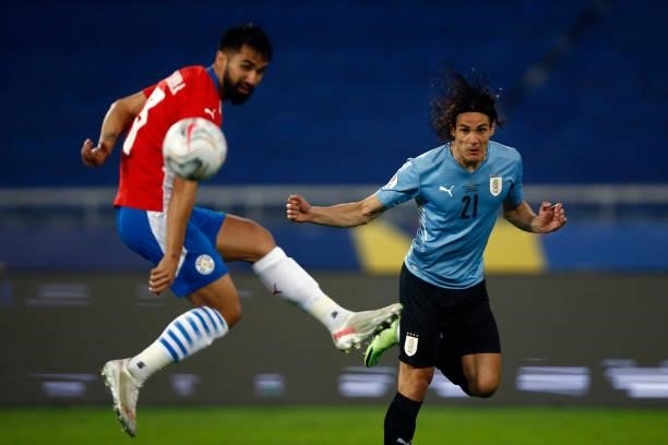 Edinson Cavani of Uruguay heads the ball during a group A match between Uruguay and Paraguay as part of Conmebol Copa America Brazil 2021 at Estadio...