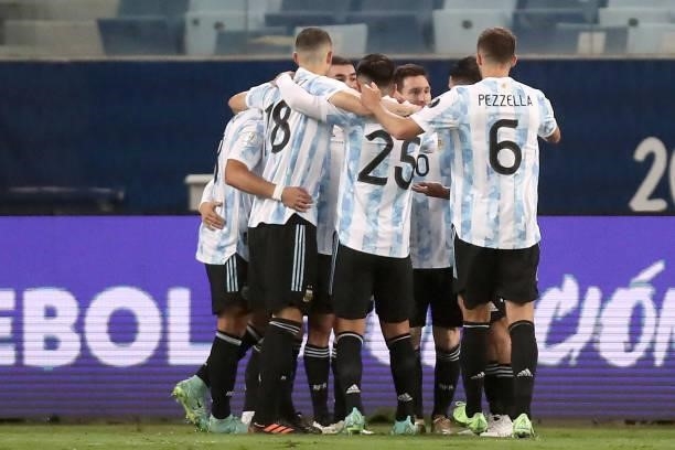 Alejandro Gomez of Argentina celebrates with teammates after scoring the first goal of his team during a Group A match between Argentina and Bolivia...