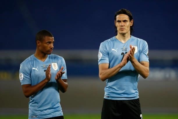 Nicolas De La Cruz and Edinson Cavani of Uruguay applaud before a group A match between Uruguay and Paraguay as part of Conmebol Copa America Brazil...