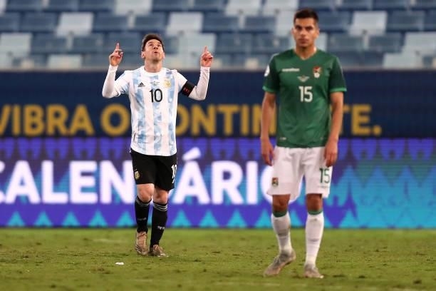 Lionel Messi of Argentina celebrates after scoring the second goal of his team via penalty during a Group A match between Argentina and Bolivia as...