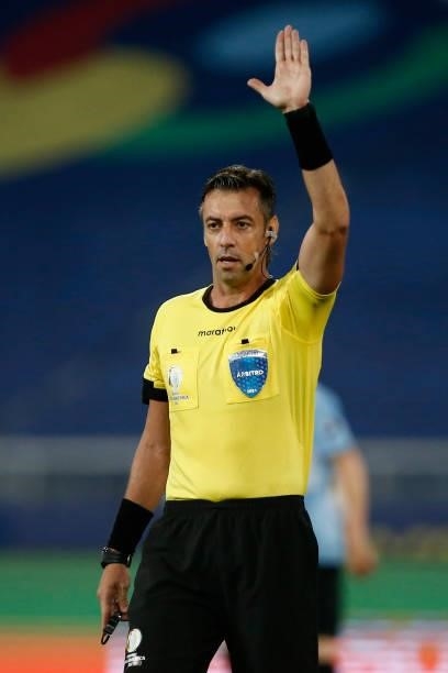 Referee Raphael Claus gestures during a group A match between Uruguay and Paraguay as part of Conmebol Copa America Brazil 2021 at Estadio Olímpico...