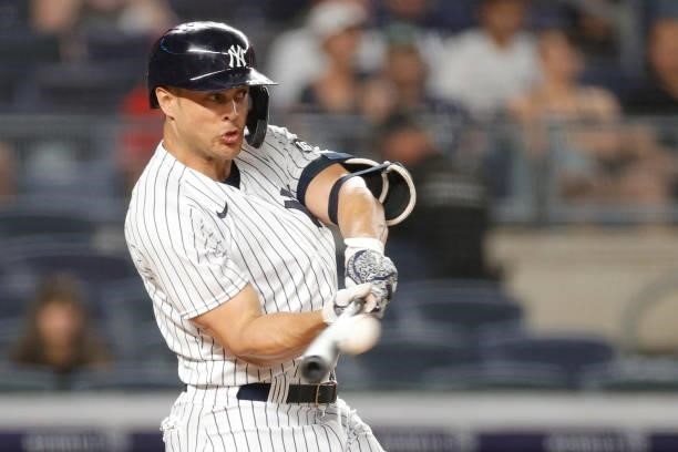 Giancarlo Stanton of the New York Yankees hits a solo home run during the sixth inning against the Los Angeles Angels at Yankee Stadium on June 28,...