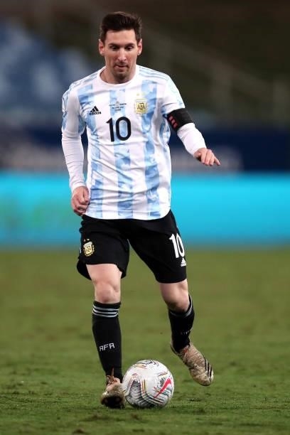 Lionel Messi of Argentina controls the ball during a Group A match between Argentina and Bolivia as part of Copa America 2021 at Arena Pantanal on...