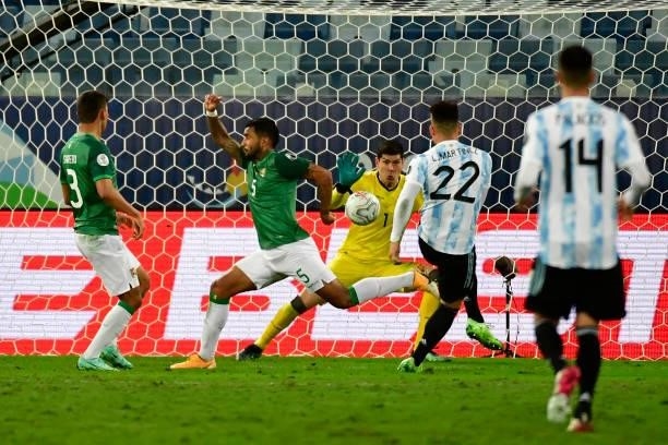 Lautaro Martinez of Argentina makes an attempt on target a Group A match between Argentina and Bolivia as part of Copa America 2021 at Arena Pantanal...