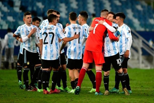 Lionel Messi of Argentina hugs teammate Franco Armani after winning a Group A match between Argentina and Bolivia as part of Copa America 2021 at...