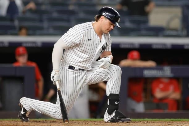 Luke Voit of the New York Yankees reacts after striking out during the ninth inning against the Los Angeles Angels at Yankee Stadium on June 28, 2021...