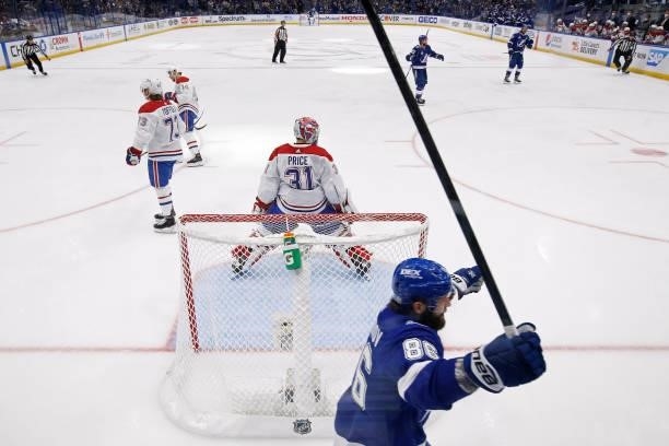 Nikita Kucherov of the Tampa Bay Lightning celebrates a goal by Erik Cernak past Carey Price of the Montreal Canadiens during the first period in...