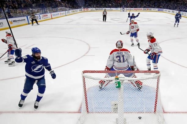 Nikita Kucherov of the Tampa Bay Lightning celebrates a goal by Erik Cernak past Carey Price of the Montreal Canadiens during the first period in...
