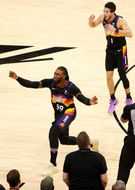 Jae Crowder and Devin Booker of the Phoenix Suns react to a foul during the second half in Game Five of the Western Conference Finals against the LA...