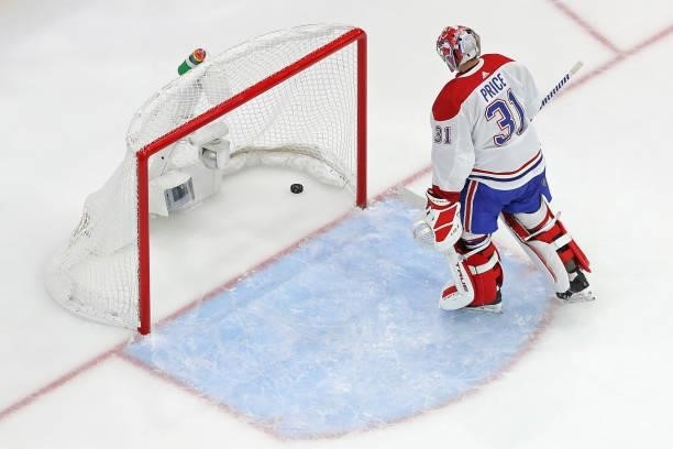 Carey Price of the Montreal Canadiens reacts after allowing a goal to Yanni Gourde of the Tampa Bay Lightning during the second period in Game One of...
