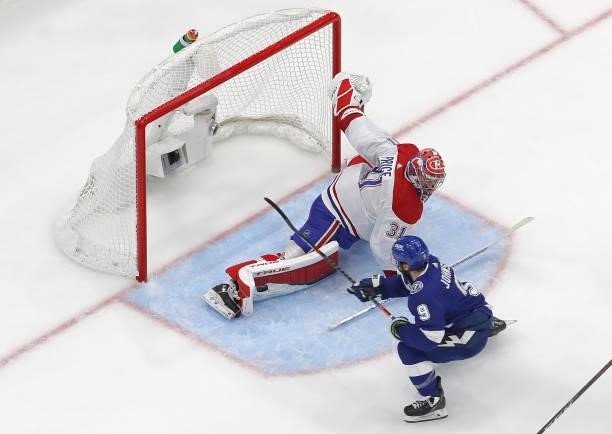 Carey Price of the Montreal Canadiens makes the save against Tyler Johnson of the Tampa Bay Lightning during the second period in Game One of the...