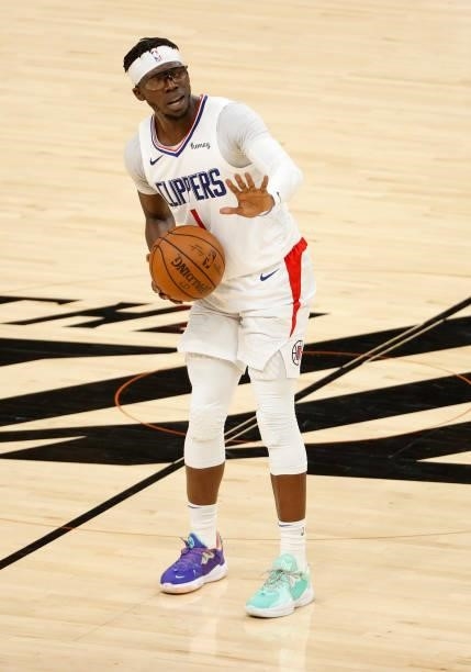 Reggie Jackson of the LA Clippers slows the game during the second half in Game Five of the Western Conference Finals against the Phoenix Suns at...