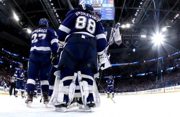 Goaltender Andrei Vasilevskiy of the Tampa Bay Lightning is congratulated by teammates after they defeated the Montreal Canadiens 5-1 in Game One of...