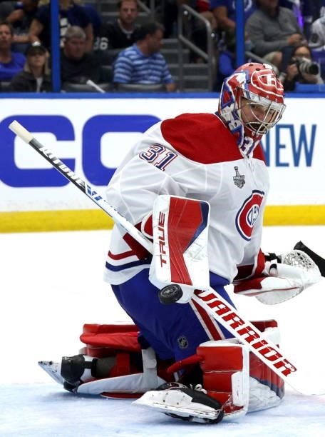 Goaltender Carey Price of the Montreal Canadiens makes a save against the Tampa Bay Lightning during the second period of Game One of the 2021...