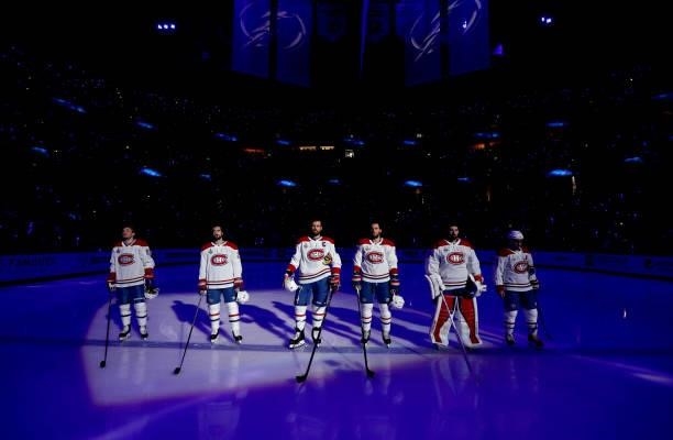 The starting line up for the Montreal Canadiens stand on the ice during pregame for Game One of the 2021 Stanley Cup Final against the Tampa Bay...
