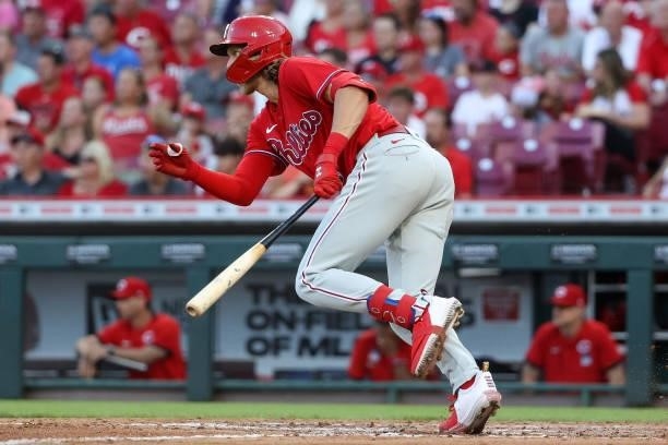Alec Bohm of the Philadelphia Phillies hits a single in the fifth inning against the Cincinnati Reds at Great American Ball Park on June 28, 2021 in...