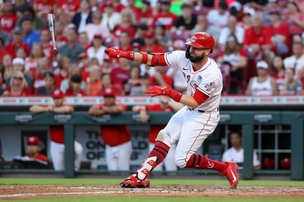 Jesse Winker of the Cincinnati Reds looses his bat striking out in the fifth inning against the Philadelphia Phillies at Great American Ball Park on...