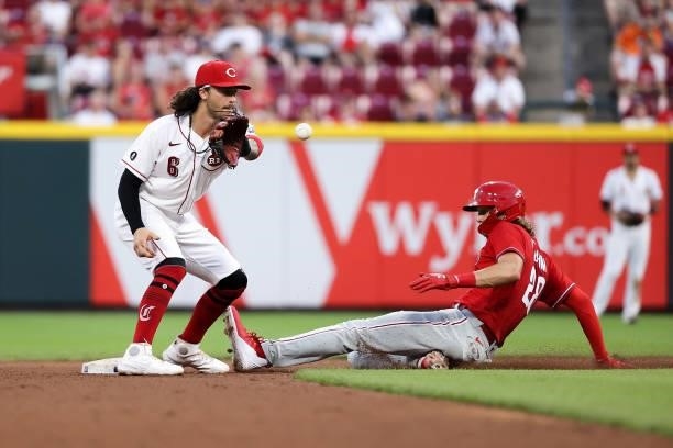 Alec Bohm of the Philadelphia Phillies steals second base past Jonathan India of the Cincinnati Reds in the seventh inning at Great American Ball...