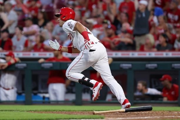 Alejo Lopez of the Cincinnati Reds hits a single for his first hit in Major League Baseball in the seventh inning against the Philadelphia Phillies...