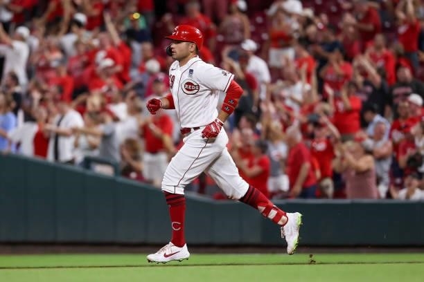 Joey Votto of the Cincinnati Reds rounds the bases after hitting a home run in the eighth inning against the Philadelphia Phillies at Great American...