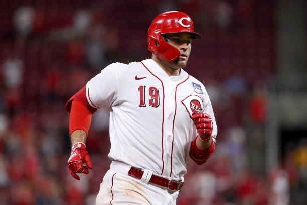 Joey Votto of the Cincinnati Reds rounds the bases after hitting a home run in the eighth inning against the Philadelphia Phillies at Great American...